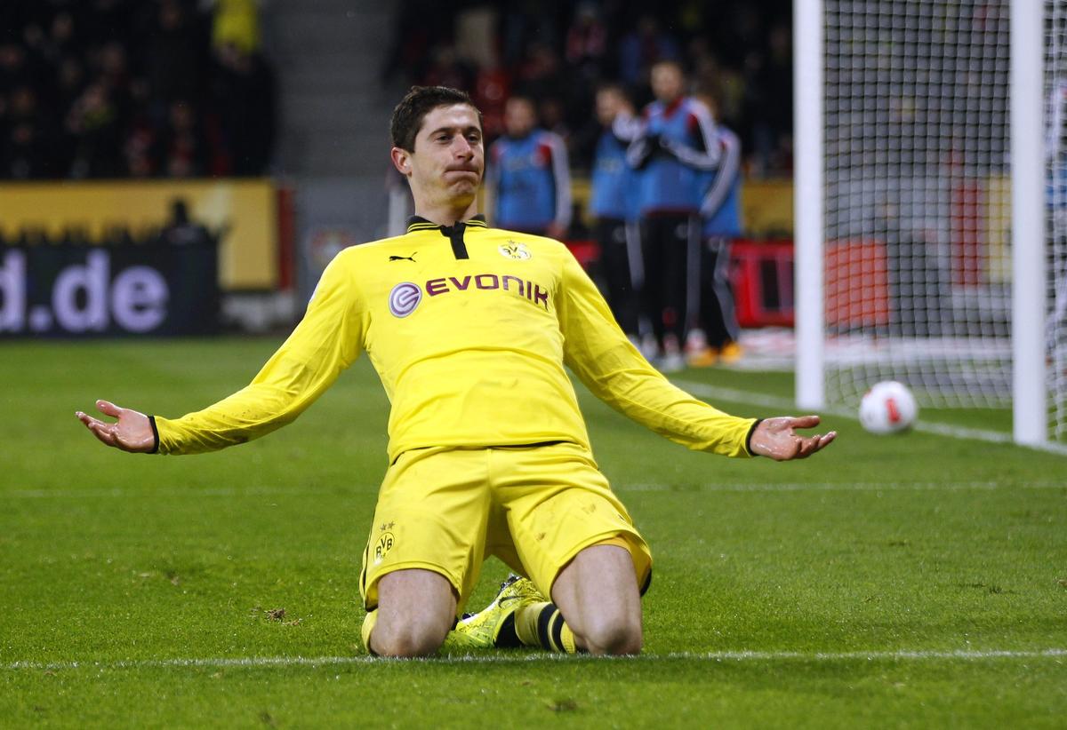 Borussia Dortmund’s Robert Lewandowski celebrates a goal against Bayer Leverkusen during the German first division Bundesliga soccer match in Leverkusen February 3, 2013. 