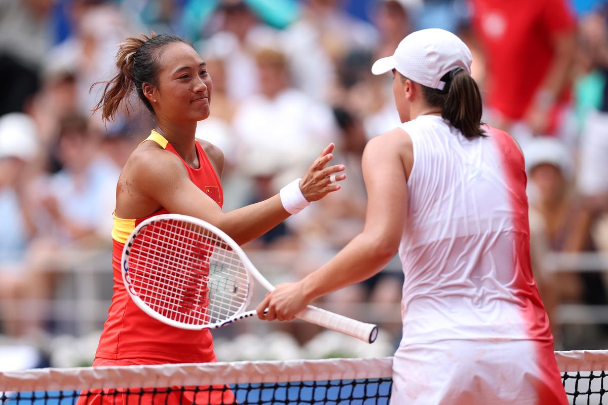 Qinwen Zheng of China celebrates victory against Iga Swiatek of Poland during the women’s singles semifinal match.