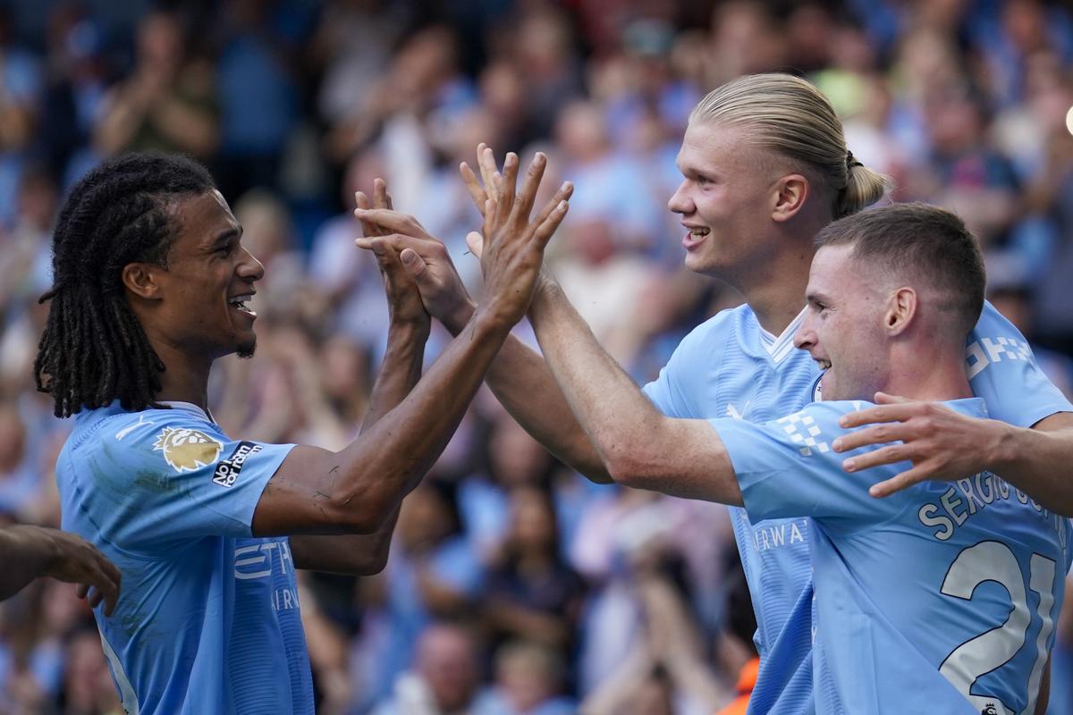 Manchester City’s Erling Haaland, second right, celebrates with teammates after scoring his side’s fifth goal during the English Premier League match between Manchester City and Fulham at the Etihad stadium in Manchester, England.