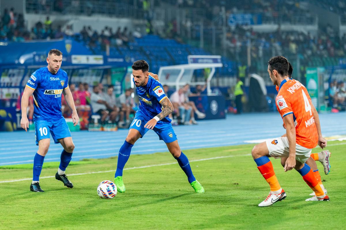 Best seat in the stadium: Chennaiyin in action in a home game against FC Goa in the Indian Super League, at the Jawaharlal Nehru Stadium.