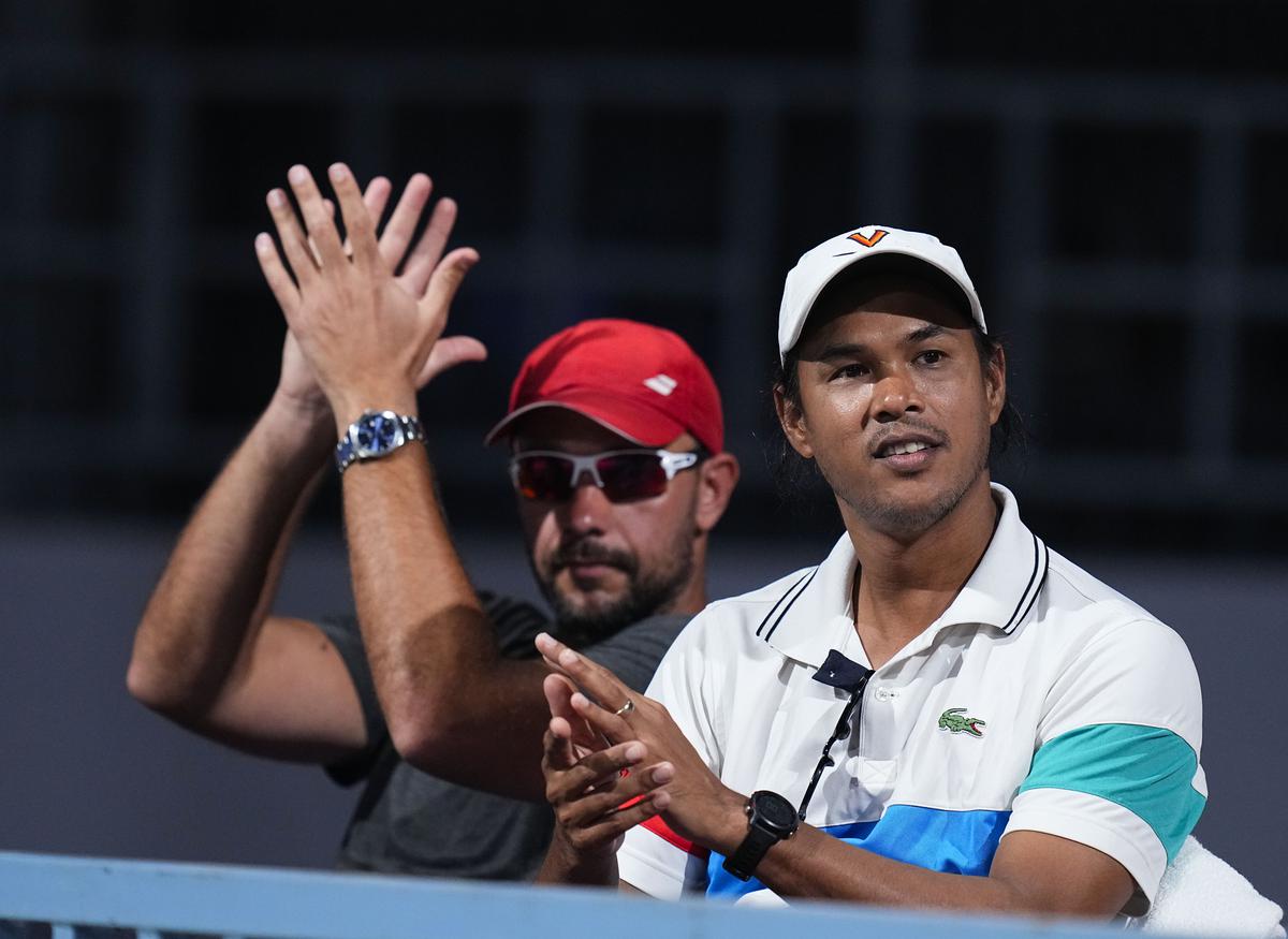 Somdev Devvarman (right) along with Milos Galecic, Sumit Nagal’s fitness trainer, during the presentation ceremony after Nagal won the singles event at the ATP Challenger Chennai Open on Sunday.