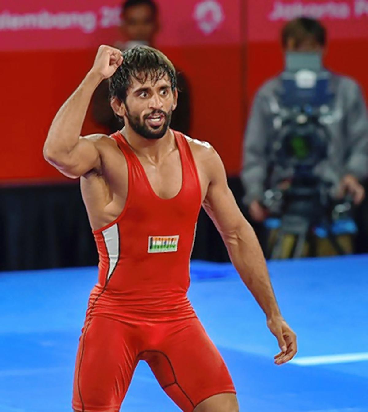 India’s Bajrang Punia gestures after winning men’s freestyle wrestling (65kg) finals against Japan’s Daichi Takatani at the Asian Games 2018.