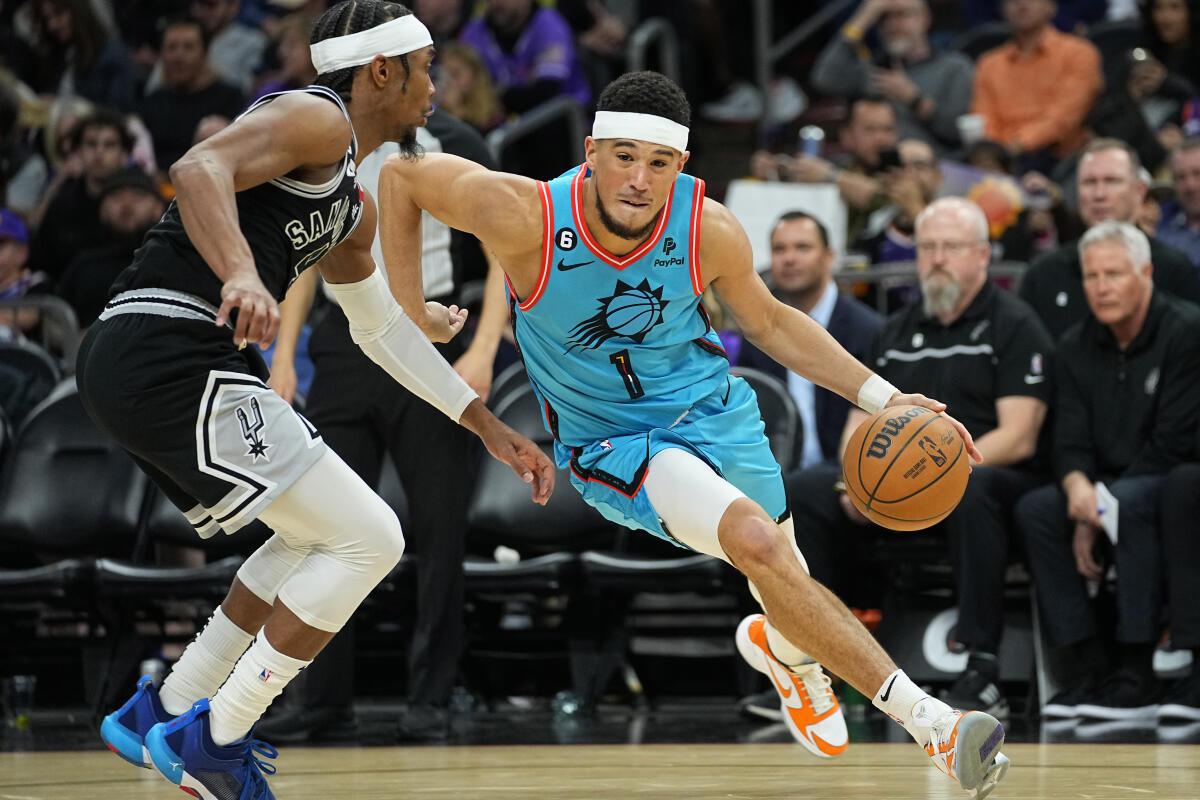 NBA: Suns clinch playoff spot, rout injury-riddled Spurs 115-94 - Sportstar