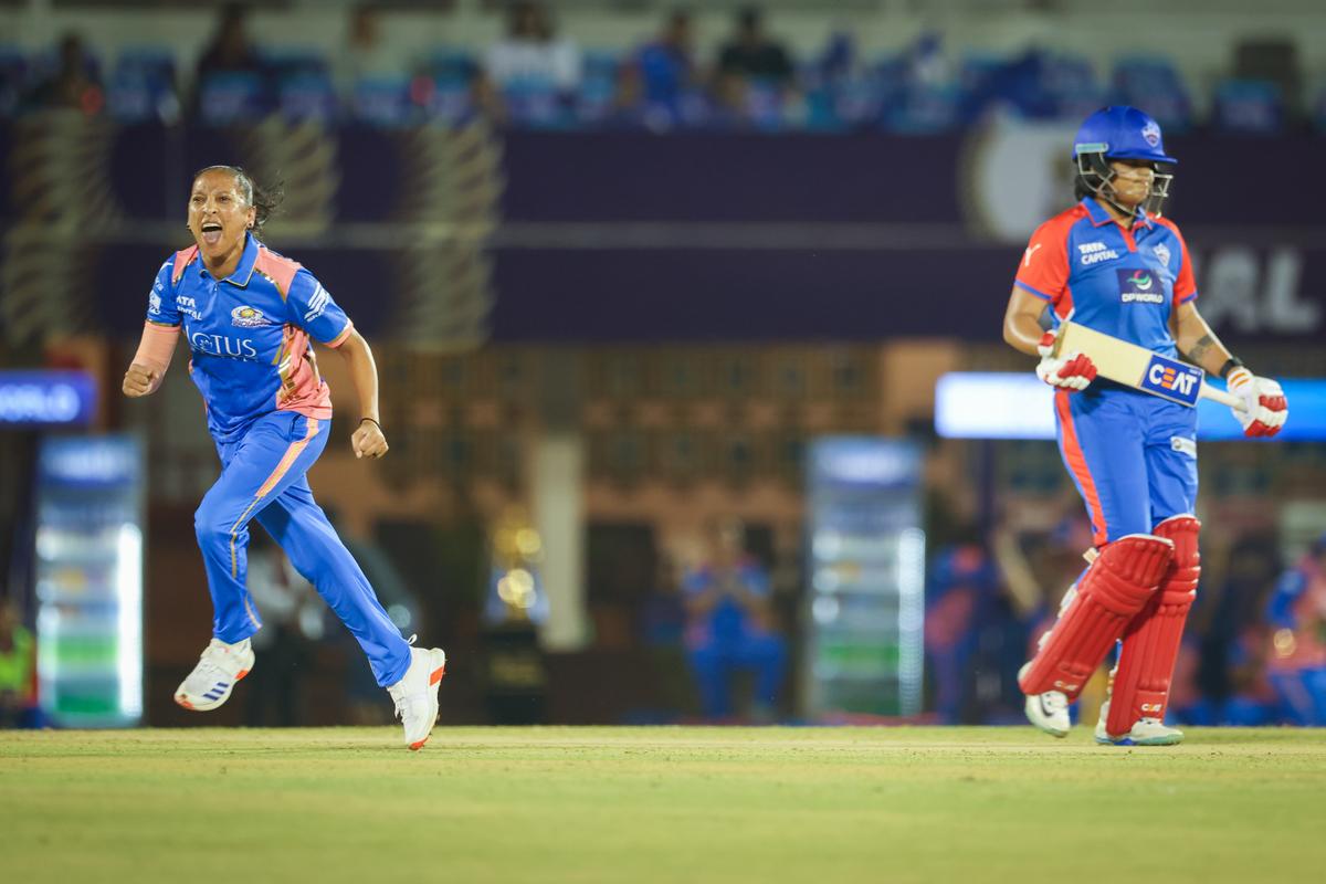 Shabnim Ismail of Mumbai Indians celebrates the wicket of Shafali Verma of Delhi Capitals during the WPL Final match between Mumbai Indians and Delhi Capitals.