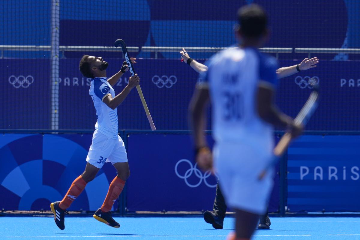 India’s Sukhjeet Singh, left, reacts during the men’s bronze medal field hockey match between Spain and India at the Yves-du-Manoir Stadium during the 2024 Summer Olympics, Thursday, Aug. 8, 2024, in Colombes, France. 