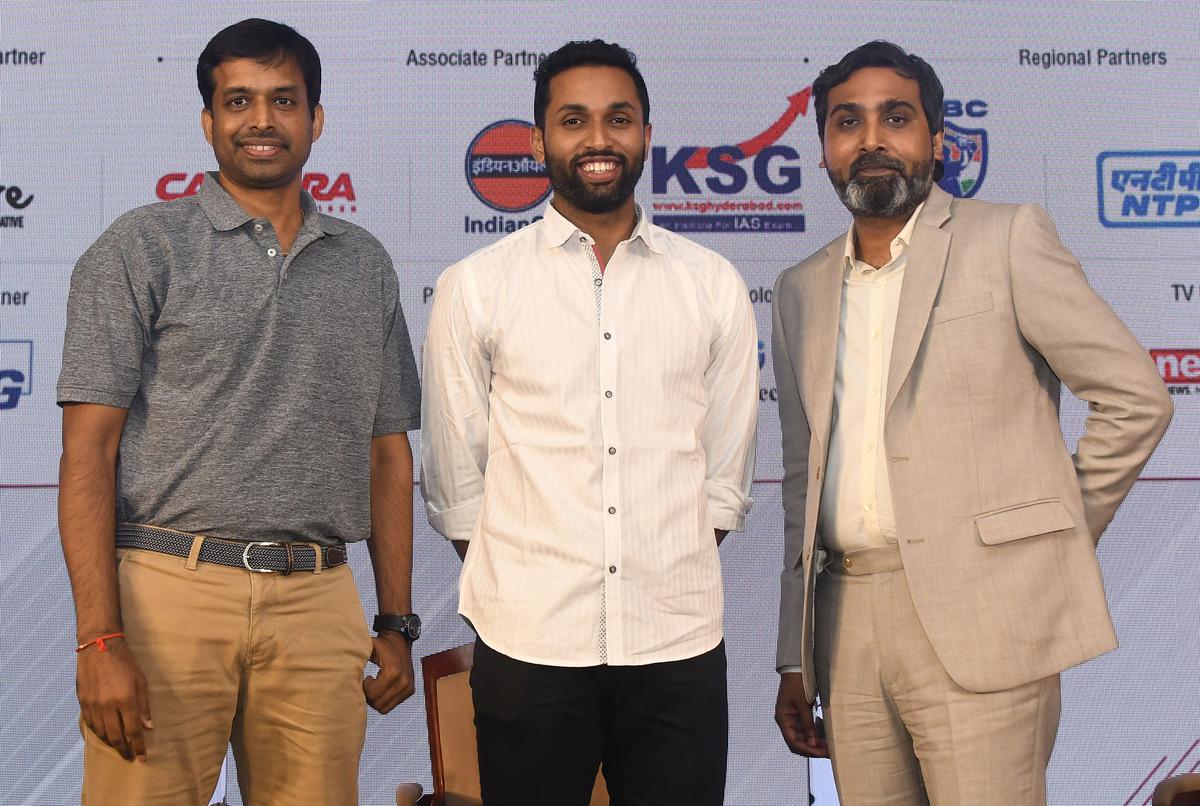 (L to R) P. Gopichand, Badminton chief national coach, HS Prannoy, and Ayon Sengupta, Editor of Sportstar, during the Sportstar Conclave - Focus Telangana in Hyderabad.