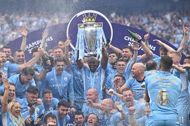 Guardiola hails Man City 'legends' after title defence