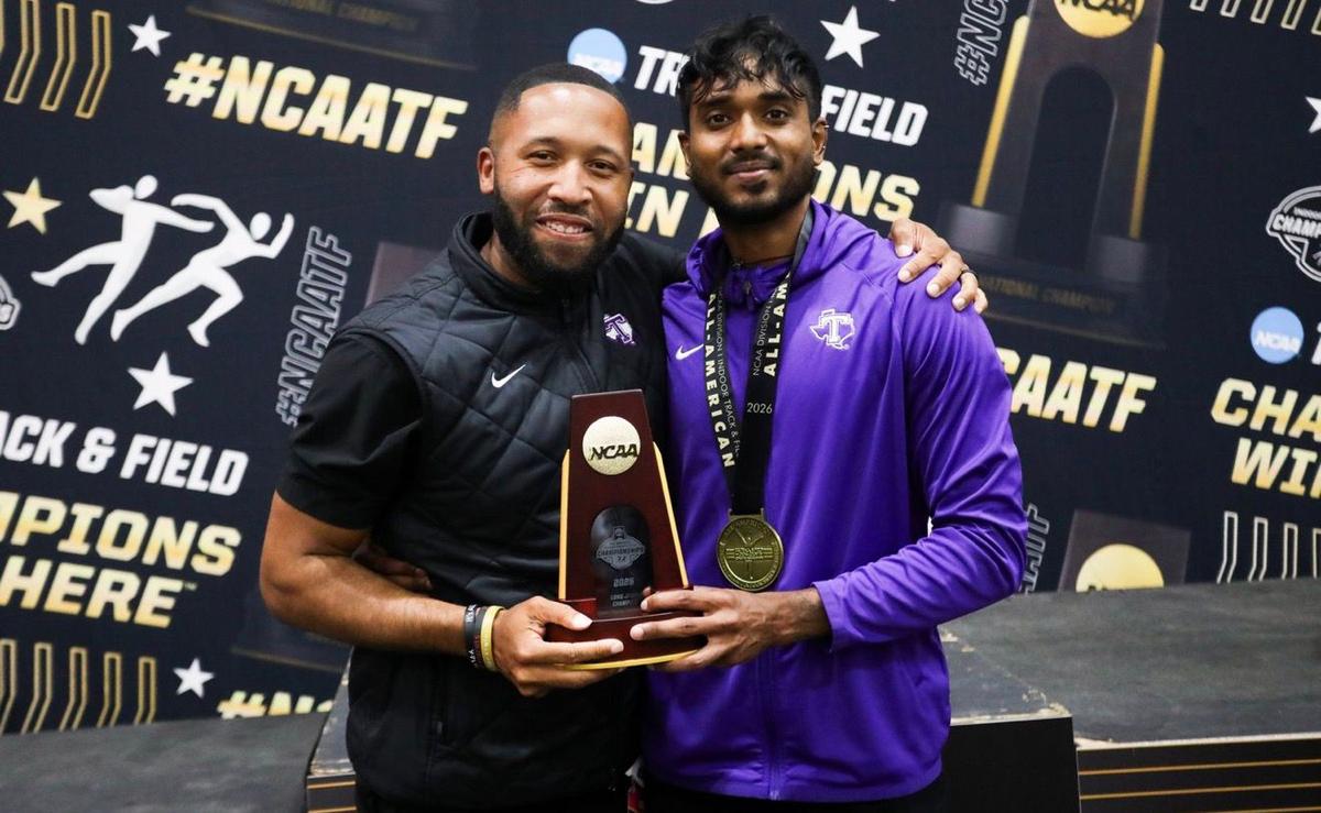 The Lokesh Sathyanathan story: How the long jumper from Bangalore leapt into history with his maiden NCAA title Few people had their eye on Lokesh Sathyanathan when he first arrived in Fayetteville, Arkansas, to take part in the men’s long jump competition at the NCAA Indoor Championships in March. The 26-year-old wasn’t expecting them to. The NCAA Indoor Championships are the highest level of competition in the indoor track and field calendar — considered the most prestigious form of collegiate sport in the world.The standard of competition is nothing less than that of a world-level meet. Lokesh, competing for Tarleton State University — a relatively small college that had never won an individual track and field title at this competition — was, to put it mildly, not a favourite.“One day before the competition, the only people who recognised me were the ones who already knew me — probably just my coach and teammates,” he recalls.That’s not the case any longer. On March 13, Lokesh leapt a career-best 8.21m to win gold. The jump set a new Indian indoor national record and moved him to third on the all-time list of Indian long jumpers across all competitions. It also made him only the fourth Indian to win gold at the NCAA Championships — joining triple jumper M.S. Gill, discus thrower Vikas Gowda, and decathlete and high jumper Tejaswin Shankar.Lokesh is unrecognised no more.“The NCAA level is nothing short of the Olympic level. You are competing with Olympic champions, World Record holders, National Record holders of different countries, world medallists. To win gold at this level is special. After the competition, I’ve done multiple interviews, but even regular people want to speak to me. Wherever you walk, people know who you are. They compliment and congratulate you. There are people who follow you on social media. People are watching my jumps. They just want to start a conversation. It’s completely different from the day before your race to the day after,” he says.Every conversation goes the same way. “People want to know where I’m from. They want to know how it feels to be an NCAA champion. They want to know how I motivate and hype myself and how I go for bigger jumps,” he says.Motivation, Lokesh says, is easy. He thinks about the hard work his parents put in to start his journey in collegiate sport in the USA. He can’t help but think about how close a freak injury, a couple of years ago, came to ending that journey, and how hard he had to work just to get another chance to compete at this level. “When I’m jumping, I always think of where I came from. Before every competition, I look back at the challenges I’ve faced in my life and think about how lucky I am to get an opportunity to show my talent once again,” he says.Journey beginsThe idea of competing in the collegiate system first came to Lokesh about eight years ago. Back in 2018, he was considered one of India’s most promising junior long jumpers, with a personal best of 7.74m that had won him gold at the Junior South Asian Championships in Colombo, Sri Lanka. After competing at the U-20 World Championships in Tampere, Finland, he attracted the attention of several coaches scouting for track and field programmes in the USA.Born and raised in Bengaluru in a sports-mad family — his father John played football for the Bengaluru Police while his sister Monica was a national-level 400-metre runner — Lokesh wasn’t certain whether he wanted to leave familiar surroundings. Any plans to shift base were further pushed back after he suffered a serious road accident while travelling to a training session.The physical and mental toll caused him to pull out of the qualifiers for the 2019 World Championships in Doha. “I would have panic attacks. I would stay by myself in a room, and eventually, my friends didn’t know what to do. I couldn’t even sleep. It was just me and my parents at that time. I had a lot of mental health issues that I was dealing with. I was on a lot of anxiety medication as a result,” he recalls.After he recovered, others nudged him to consider college offers from the USA once again. He was still uncertain. “At that time, I felt if I did go, I’d just be seen as an average athlete who hadn’t accomplished anything. I didn’t think I was good enough,” he says.As time passed, Lokesh’s enthusiasm to train abroad waned, even as he continued to improve. He won gold at the South Asian Games in Kathmandu and recorded a personal best of 7.93m at the selection trials for the World University Games in early 2021. At 35, Bobby Carter (left) is one of the youngest head coaches in Division I — the highest level of the NCAA system. He grew up in a family of high-level athletes, with his cousin Michelle Carter having won Olympic gold in shot put in 2016. In Lokesh (right), he saw something special — not just his build and physicality, but also the mindset.
| Photo Credit:
Special Arrangement
At 35, Bobby Carter (left) is one of the youngest head coaches in Division I — the highest level of the NCAA system. He grew up in a family of high-level athletes, with his cousin Michelle Carter having won Olympic gold in shot put in 2016. In Lokesh (right), he saw something special — not just his build and physicality, but also the mindset.
| Photo Credit:
Special Arrangement
It was only rekindled in the most painful of circumstances during the second wave of the COVID-19 pandemic in India. When Lokesh’s mother fell ill, the family didn’t worry at first — until her condition deteriorated suddenly. With doctors preparing the family for the inevitable, Lokesh was permitted to visit her.“When she was in the last stages of her life, she held my hand, kissed it, and started crying. She just said I had to make the most of whatever opportunity I had. That was the last thing she spoke to me,” he says.Until then, Mary had never tried to influence her son in any way. “In my entire athletic career, she had been nothing but supportive. She was my biggest motivation. If I had a bad day or if I lost, she would tell me she was there for me, and then she would cook my favourite food so that I would feel better. When I lost her, it was as if I lost everything,” he says.The shock sent him into a cycle of despair once again. “I was unable to come out of my room. I wasn’t meeting any of my friends. I was once again taking medication for my mental health issues,” he says.But a conversation with his father changed things. “He told me how, without any warning, my mom was no longer with me. You never know when we won’t have time to fulfil our desires. Whatever time and opportunity we get, we have to grab it and work for what we want. I had to get up, start crawling, run, and move. I can’t be still in one place,” he says.Two months after his mother passed away, Lokesh once again started applying to colleges in the USA. “I was essentially just sending cold emails to whoever I could. I asked coaches and athletes I had met to recommend me to others. I became very serious about it. I’d stay up late so I could reply to emails immediately,” he says.As it turned out, coaches were still interested. Eventually, he was offered a full scholarship by the University of New Mexico.Struggles and second chancesAt first, the move seemed to work out for him. In May 2023, Lokesh made his first jump over 8m — with a leap of 8.02m at the Mountain West Outdoor Track & Field Championships in Clovis. In his first year in the collegiate circuit, he even made it to the NCAA outdoor track and field finals.Later that year, when his coach moved to the University of Louisville, Lokesh followed. He had built a base for his collegiate career. Now it was time for him to take off.That didn’t happen.Lokesh says he was taking part in an off-season gym session when a teammate dropped a weight on his right toe, fracturing it. “It came at the worst possible time. I was about six months away from the Olympic selection trials in India. I was really confident I would do well, but I ended up having to get surgery instead,” he recalls.Things only got worse. One month after surgery, as he began rehabilitation, Lokesh realised something was very wrong. “One of the screws the doctors had placed inside my bone popped out the other side and started piercing through the flesh and bleeding,” he says.His coaches didn’t take his concern seriously. “They felt it was an infection and I could treat it with antibiotics. Of course, it didn’t work. It only got worse. For 14 days, I couldn’t sleep because of the pain, but all the while people kept telling me these things were normal,” he recalls.Eventually, Lokesh says he could take it no more. He left his college and flew back to India for a second opinion — and got one just in time. “The doctor told me I needed surgery immediately because the infection was about to reach the bone. They had to take out the screw. It was a very critical situation,” he says.As he began rehabilitation in India, Lokesh wondered how he can return to jumping. “I never thought I would give up athletics because of what it meant to my parents and what my mother had told me before she passed away. But I was also uncertain about going back to the USA because of the experience I had there. I reached out to every possible person in India who I thought could help me — the state government, private institutes, even different states. I told them I just needed some support. But all I heard was ‘we can’t help you’. Everyone said they’d help only if I started jumping again,” he recalls.Finally, Lokesh realised he had to give college in the USA another try. “I didn’t have any support in India, and at least in the USA I’d have support to continue my academics and training. In the collegiate system, at least my training would be taken care of by my school. That’s when I reached out to coach Bobby Carter and that’s when things started falling into place,” he says. A 7.92m jump early in the 2025 season qualified Lokesh for his first NCAA indoor championships. Later, he jumped a personal best of 8.14m at the Michael Johnson Invitational, which qualified him for the NCAA outdoor final, where he finished fifth. It was the high point of a solid, if not spectacular, comeback season.
| Photo Credit:
Getty Images
A 7.92m jump early in the 2025 season qualified Lokesh for his first NCAA indoor championships. Later, he jumped a personal best of 8.14m at the Michael Johnson Invitational, which qualified him for the NCAA outdoor final, where he finished fifth. It was the high point of a solid, if not spectacular, comeback season.
| Photo Credit:
Getty Images
Before joining the University of New Mexico, Lokesh had got to know Carter while exploring different schools. The two had stayed in touch, and in 2024 Lokesh reached out again after Carter had taken over the track and field programme at Tarleton University. “I was a little nervous because I hadn’t competed for a year, but coach Carter simply said, ‘I’d love to have you over,’” he says.At 35, Carter is one of the youngest head coaches in Division I — the highest level of the NCAA system. He grew up in a family of high-level athletes, with his cousin Michelle Carter having won Olympic gold in shot put in 2016. In Lokesh, he saw something special — not just his build and physicality, but also the mindset.“I saw in his eyes all the things he had been through. But I also saw someone who didn’t want to give up. You can’t help but want to go out to bat for someone like that. From an athletics standpoint, I could tell he had the qualities of an athlete. But I could also tell this was a kid with a dream who just needed some help along the way. In my first conversation with him, he said, ‘Coach, I want to be the best.’ That’s all I needed. I took that and ran with it,” Carter says.Lokesh is grateful for the support he got. “I consider myself really lucky that I could connect with coach Carter. He’s one of my biggest supporters. He’s my cheerleader, mentor, coach, best friend, and a father figure rolled into one. He never made me feel like a stranger or incapable. He always believed in me and told me I can achieve anything,” he says.Although Tarleton didn’t have a particularly renowned track and field programme unlike the colleges Lokesh had previously trained at, he says the move suited him. “It’s a smaller school, about two hours from Dallas. But that was fine. There are fewer distractions. There’s nothing much to do but train. It has a track, it has a gym. Being smaller meant more focus on me and stronger support systems. It was the perfect place to recover,” he says.Slowly, things fell into place.A 7.92m jump early in the 2025 season qualified him for his first NCAA indoor championships. Later, he jumped a personal best of 8.14m at the Michael Johnson Invitational, which qualified him for the NCAA outdoor final, where he finished fifth. It was the high point of a solid, if not spectacular, comeback season.At the start of 2026, however, Carter sensed that Lokesh was building towards something much more significant. “Early in the season, Lokesh competed in Oklahoma at the JD Martin Invitational. He won with 7.85m, but he also had a foul jump by a very narrow margin that I estimated was at least 8.20m. That gave him confidence that he had a really big jump in him,” says Carter. That would come at the biggest stage possible — at the NCAA Indoor Championships final.Before the competition, Lokesh wasn’t thinking about his competitors. “I just thanked God that I had another opportunity to compete at this level,” he says.In second place after three attempts, everything came together in his fourth jump. Running in hard, he hit the board square. Using the double hitch kick, he cycled his legs twice as he took off before landing near the far edge of the pit. The jump put him into the lead, which he never gave up.When it ended, Lokesh leapt into his coach’s arms. He pointed to the sky in tribute to his mother, whose picture he carries everywhere. When he called his father, who had been following updates from India, both were in tears. “We were both crying but they were happy tears,” he says.Coach Carter admitted he too was crying when he went home that day. “It was just a really emotional moment,” he says.Bigger goalsHowever, despite the magnitude of the win, neither has formally celebrated it. That’s because, as big as becoming NCAA champion feels, both believe Lokesh could have done even more. In his final attempt of the day, Lokesh had made another huge jump of 8.17m. When he came off the sand though he grimaced. “Everything was so good in the take-off that I got overexcited and dropped my hips on landing. It cost me 20–30 cm. It could have been 8.40m,” he says. Lokesh and Carter now aims for the Indian record currently standing at 8.42m (Jeswin Aldrin). But it won’t be easy.
| Photo Credit:
Special Arrangement
Lokesh and Carter now aims for the Indian record currently standing at 8.42m (Jeswin Aldrin). But it won’t be easy.
| Photo Credit:
Special Arrangement
Carter hopes that the miss acts as a motivation. “Both of us have bigger goals that we want to accomplish. Lokesh’s goal is to jump over 8.50m outdoors,” he says.With the Indian record currently standing at 8.42m (Jeswin Aldrin), that won’t be easy, but Carter is optimistic. “It’s very possible. He has the ability to be one of the best Indian jumpers of all time. Right now, our challenge is to stay consistent with technique. I know he has the technical ability to get to the 8.50m mark. It’s just about the little things — eating right and competing in the right events,” he says. There are also Lokesh’s own ambitions. “I want to compete on the biggest stages and win a major medal for India at the Commonwealth and Asian Games,” he says.This, though, won’t be entirely up to him. To represent India, he will have to take part in selection tournaments in the country. That, in turn, means frequent travel between his base at Tarleton and India — adding up to a significant expense. Indeed, even competing in the USA will be challenging in the months to come. Having already competed in university-level competitions in India, he is no longer eligible for outdoor NCAA events and has only one year of eligibility left for indoor competitions. While he can still take part in them as a representative of Tarleton, it will be as an unattached athlete, meaning he would have to cover his own expenses. “So far, I don’t have a sponsor. If I get one, it would make my journey much easier,” he says.Even so, Lokesh remains undeterred. “I think I’m meant to do something special. I’ve already come such a long way. I’ll keep pushing,” he says.Published on Apr 08, 2026 #Lokesh #Sathyanathan #story #long #jumper #Bangalore #leapt #history #maiden #NCAA #title The Lokesh Sathyanathan story: How the long jumper from Bangalore leapt into history with his maiden NCAA title Few people had their eye on Lokesh Sathyanathan when he first arrived in Fayetteville, Arkansas, to take part in the men’s long jump competition at the NCAA Indoor Championships in March. The 26-year-old wasn’t expecting them to. The NCAA Indoor Championships are the highest level of competition in the indoor track and field calendar — considered the most prestigious form of collegiate sport in the world.The standard of competition is nothing less than that of a world-level meet. Lokesh, competing for Tarleton State University — a relatively small college that had never won an individual track and field title at this competition — was, to put it mildly, not a favourite.“One day before the competition, the only people who recognised me were the ones who already knew me — probably just my coach and teammates,” he recalls.That’s not the case any longer. On March 13, Lokesh leapt a career-best 8.21m to win gold. The jump set a new Indian indoor national record and moved him to third on the all-time list of Indian long jumpers across all competitions. It also made him only the fourth Indian to win gold at the NCAA Championships — joining triple jumper M.S. Gill, discus thrower Vikas Gowda, and decathlete and high jumper Tejaswin Shankar.Lokesh is unrecognised no more.“The NCAA level is nothing short of the Olympic level. You are competing with Olympic champions, World Record holders, National Record holders of different countries, world medallists. To win gold at this level is special. After the competition, I’ve done multiple interviews, but even regular people want to speak to me. Wherever you walk, people know who you are. They compliment and congratulate you. There are people who follow you on social media. People are watching my jumps. They just want to start a conversation. It’s completely different from the day before your race to the day after,” he says.Every conversation goes the same way. “People want to know where I’m from. They want to know how it feels to be an NCAA champion. They want to know how I motivate and hype myself and how I go for bigger jumps,” he says.Motivation, Lokesh says, is easy. He thinks about the hard work his parents put in to start his journey in collegiate sport in the USA. He can’t help but think about how close a freak injury, a couple of years ago, came to ending that journey, and how hard he had to work just to get another chance to compete at this level. “When I’m jumping, I always think of where I came from. Before every competition, I look back at the challenges I’ve faced in my life and think about how lucky I am to get an opportunity to show my talent once again,” he says.Journey beginsThe idea of competing in the collegiate system first came to Lokesh about eight years ago. Back in 2018, he was considered one of India’s most promising junior long jumpers, with a personal best of 7.74m that had won him gold at the Junior South Asian Championships in Colombo, Sri Lanka. After competing at the U-20 World Championships in Tampere, Finland, he attracted the attention of several coaches scouting for track and field programmes in the USA.Born and raised in Bengaluru in a sports-mad family — his father John played football for the Bengaluru Police while his sister Monica was a national-level 400-metre runner — Lokesh wasn’t certain whether he wanted to leave familiar surroundings. Any plans to shift base were further pushed back after he suffered a serious road accident while travelling to a training session.The physical and mental toll caused him to pull out of the qualifiers for the 2019 World Championships in Doha. “I would have panic attacks. I would stay by myself in a room, and eventually, my friends didn’t know what to do. I couldn’t even sleep. It was just me and my parents at that time. I had a lot of mental health issues that I was dealing with. I was on a lot of anxiety medication as a result,” he recalls.After he recovered, others nudged him to consider college offers from the USA once again. He was still uncertain. “At that time, I felt if I did go, I’d just be seen as an average athlete who hadn’t accomplished anything. I didn’t think I was good enough,” he says.As time passed, Lokesh’s enthusiasm to train abroad waned, even as he continued to improve. He won gold at the South Asian Games in Kathmandu and recorded a personal best of 7.93m at the selection trials for the World University Games in early 2021. At 35, Bobby Carter (left) is one of the youngest head coaches in Division I — the highest level of the NCAA system. He grew up in a family of high-level athletes, with his cousin Michelle Carter having won Olympic gold in shot put in 2016. In Lokesh (right), he saw something special — not just his build and physicality, but also the mindset.
| Photo Credit:
Special Arrangement
At 35, Bobby Carter (left) is one of the youngest head coaches in Division I — the highest level of the NCAA system. He grew up in a family of high-level athletes, with his cousin Michelle Carter having won Olympic gold in shot put in 2016. In Lokesh (right), he saw something special — not just his build and physicality, but also the mindset.
| Photo Credit:
Special Arrangement
It was only rekindled in the most painful of circumstances during the second wave of the COVID-19 pandemic in India. When Lokesh’s mother fell ill, the family didn’t worry at first — until her condition deteriorated suddenly. With doctors preparing the family for the inevitable, Lokesh was permitted to visit her.“When she was in the last stages of her life, she held my hand, kissed it, and started crying. She just said I had to make the most of whatever opportunity I had. That was the last thing she spoke to me,” he says.Until then, Mary had never tried to influence her son in any way. “In my entire athletic career, she had been nothing but supportive. She was my biggest motivation. If I had a bad day or if I lost, she would tell me she was there for me, and then she would cook my favourite food so that I would feel better. When I lost her, it was as if I lost everything,” he says.The shock sent him into a cycle of despair once again. “I was unable to come out of my room. I wasn’t meeting any of my friends. I was once again taking medication for my mental health issues,” he says.But a conversation with his father changed things. “He told me how, without any warning, my mom was no longer with me. You never know when we won’t have time to fulfil our desires. Whatever time and opportunity we get, we have to grab it and work for what we want. I had to get up, start crawling, run, and move. I can’t be still in one place,” he says.Two months after his mother passed away, Lokesh once again started applying to colleges in the USA. “I was essentially just sending cold emails to whoever I could. I asked coaches and athletes I had met to recommend me to others. I became very serious about it. I’d stay up late so I could reply to emails immediately,” he says.As it turned out, coaches were still interested. Eventually, he was offered a full scholarship by the University of New Mexico.Struggles and second chancesAt first, the move seemed to work out for him. In May 2023, Lokesh made his first jump over 8m — with a leap of 8.02m at the Mountain West Outdoor Track & Field Championships in Clovis. In his first year in the collegiate circuit, he even made it to the NCAA outdoor track and field finals.Later that year, when his coach moved to the University of Louisville, Lokesh followed. He had built a base for his collegiate career. Now it was time for him to take off.That didn’t happen.Lokesh says he was taking part in an off-season gym session when a teammate dropped a weight on his right toe, fracturing it. “It came at the worst possible time. I was about six months away from the Olympic selection trials in India. I was really confident I would do well, but I ended up having to get surgery instead,” he recalls.Things only got worse. One month after surgery, as he began rehabilitation, Lokesh realised something was very wrong. “One of the screws the doctors had placed inside my bone popped out the other side and started piercing through the flesh and bleeding,” he says.His coaches didn’t take his concern seriously. “They felt it was an infection and I could treat it with antibiotics. Of course, it didn’t work. It only got worse. For 14 days, I couldn’t sleep because of the pain, but all the while people kept telling me these things were normal,” he recalls.Eventually, Lokesh says he could take it no more. He left his college and flew back to India for a second opinion — and got one just in time. “The doctor told me I needed surgery immediately because the infection was about to reach the bone. They had to take out the screw. It was a very critical situation,” he says.As he began rehabilitation in India, Lokesh wondered how he can return to jumping. “I never thought I would give up athletics because of what it meant to my parents and what my mother had told me before she passed away. But I was also uncertain about going back to the USA because of the experience I had there. I reached out to every possible person in India who I thought could help me — the state government, private institutes, even different states. I told them I just needed some support. But all I heard was ‘we can’t help you’. Everyone said they’d help only if I started jumping again,” he recalls.Finally, Lokesh realised he had to give college in the USA another try. “I didn’t have any support in India, and at least in the USA I’d have support to continue my academics and training. In the collegiate system, at least my training would be taken care of by my school. That’s when I reached out to coach Bobby Carter and that’s when things started falling into place,” he says. A 7.92m jump early in the 2025 season qualified Lokesh for his first NCAA indoor championships. Later, he jumped a personal best of 8.14m at the Michael Johnson Invitational, which qualified him for the NCAA outdoor final, where he finished fifth. It was the high point of a solid, if not spectacular, comeback season.
| Photo Credit:
Getty Images
A 7.92m jump early in the 2025 season qualified Lokesh for his first NCAA indoor championships. Later, he jumped a personal best of 8.14m at the Michael Johnson Invitational, which qualified him for the NCAA outdoor final, where he finished fifth. It was the high point of a solid, if not spectacular, comeback season.
| Photo Credit:
Getty Images
Before joining the University of New Mexico, Lokesh had got to know Carter while exploring different schools. The two had stayed in touch, and in 2024 Lokesh reached out again after Carter had taken over the track and field programme at Tarleton University. “I was a little nervous because I hadn’t competed for a year, but coach Carter simply said, ‘I’d love to have you over,’” he says.At 35, Carter is one of the youngest head coaches in Division I — the highest level of the NCAA system. He grew up in a family of high-level athletes, with his cousin Michelle Carter having won Olympic gold in shot put in 2016. In Lokesh, he saw something special — not just his build and physicality, but also the mindset.“I saw in his eyes all the things he had been through. But I also saw someone who didn’t want to give up. You can’t help but want to go out to bat for someone like that. From an athletics standpoint, I could tell he had the qualities of an athlete. But I could also tell this was a kid with a dream who just needed some help along the way. In my first conversation with him, he said, ‘Coach, I want to be the best.’ That’s all I needed. I took that and ran with it,” Carter says.Lokesh is grateful for the support he got. “I consider myself really lucky that I could connect with coach Carter. He’s one of my biggest supporters. He’s my cheerleader, mentor, coach, best friend, and a father figure rolled into one. He never made me feel like a stranger or incapable. He always believed in me and told me I can achieve anything,” he says.Although Tarleton didn’t have a particularly renowned track and field programme unlike the colleges Lokesh had previously trained at, he says the move suited him. “It’s a smaller school, about two hours from Dallas. But that was fine. There are fewer distractions. There’s nothing much to do but train. It has a track, it has a gym. Being smaller meant more focus on me and stronger support systems. It was the perfect place to recover,” he says.Slowly, things fell into place.A 7.92m jump early in the 2025 season qualified him for his first NCAA indoor championships. Later, he jumped a personal best of 8.14m at the Michael Johnson Invitational, which qualified him for the NCAA outdoor final, where he finished fifth. It was the high point of a solid, if not spectacular, comeback season.At the start of 2026, however, Carter sensed that Lokesh was building towards something much more significant. “Early in the season, Lokesh competed in Oklahoma at the JD Martin Invitational. He won with 7.85m, but he also had a foul jump by a very narrow margin that I estimated was at least 8.20m. That gave him confidence that he had a really big jump in him,” says Carter. That would come at the biggest stage possible — at the NCAA Indoor Championships final.Before the competition, Lokesh wasn’t thinking about his competitors. “I just thanked God that I had another opportunity to compete at this level,” he says.In second place after three attempts, everything came together in his fourth jump. Running in hard, he hit the board square. Using the double hitch kick, he cycled his legs twice as he took off before landing near the far edge of the pit. The jump put him into the lead, which he never gave up.When it ended, Lokesh leapt into his coach’s arms. He pointed to the sky in tribute to his mother, whose picture he carries everywhere. When he called his father, who had been following updates from India, both were in tears. “We were both crying but they were happy tears,” he says.Coach Carter admitted he too was crying when he went home that day. “It was just a really emotional moment,” he says.Bigger goalsHowever, despite the magnitude of the win, neither has formally celebrated it. That’s because, as big as becoming NCAA champion feels, both believe Lokesh could have done even more. In his final attempt of the day, Lokesh had made another huge jump of 8.17m. When he came off the sand though he grimaced. “Everything was so good in the take-off that I got overexcited and dropped my hips on landing. It cost me 20–30 cm. It could have been 8.40m,” he says. Lokesh and Carter now aims for the Indian record currently standing at 8.42m (Jeswin Aldrin). But it won’t be easy.
| Photo Credit:
Special Arrangement
Lokesh and Carter now aims for the Indian record currently standing at 8.42m (Jeswin Aldrin). But it won’t be easy.
| Photo Credit:
Special Arrangement
Carter hopes that the miss acts as a motivation. “Both of us have bigger goals that we want to accomplish. Lokesh’s goal is to jump over 8.50m outdoors,” he says.With the Indian record currently standing at 8.42m (Jeswin Aldrin), that won’t be easy, but Carter is optimistic. “It’s very possible. He has the ability to be one of the best Indian jumpers of all time. Right now, our challenge is to stay consistent with technique. I know he has the technical ability to get to the 8.50m mark. It’s just about the little things — eating right and competing in the right events,” he says. There are also Lokesh’s own ambitions. “I want to compete on the biggest stages and win a major medal for India at the Commonwealth and Asian Games,” he says.This, though, won’t be entirely up to him. To represent India, he will have to take part in selection tournaments in the country. That, in turn, means frequent travel between his base at Tarleton and India — adding up to a significant expense. Indeed, even competing in the USA will be challenging in the months to come. Having already competed in university-level competitions in India, he is no longer eligible for outdoor NCAA events and has only one year of eligibility left for indoor competitions. While he can still take part in them as a representative of Tarleton, it will be as an unattached athlete, meaning he would have to cover his own expenses. “So far, I don’t have a sponsor. If I get one, it would make my journey much easier,” he says.Even so, Lokesh remains undeterred. “I think I’m meant to do something special. I’ve already come such a long way. I’ll keep pushing,” he says.Published on Apr 08, 2026 #Lokesh #Sathyanathan #story #long #jumper #Bangalore #leapt #history #maiden #NCAA #title