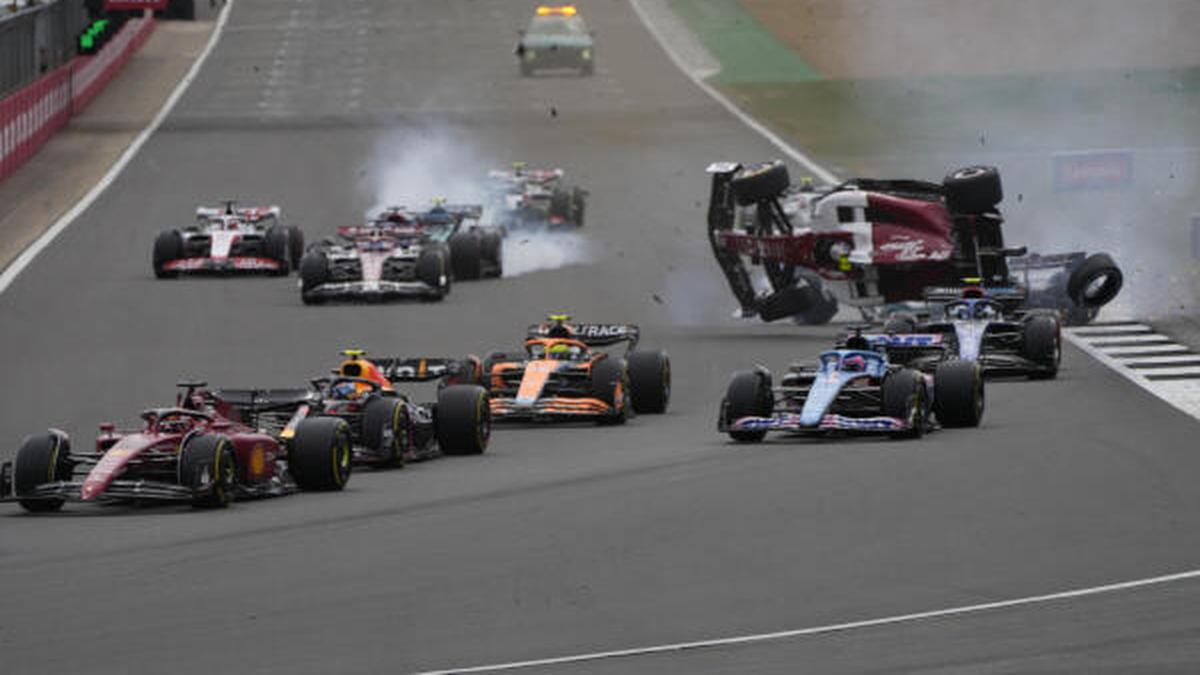 British Grand Prix red flagged after Zhou Guanyu crashes during opening lap