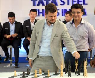 Chess: Carlsen blows Nepomniachtchi away to claim fifth world