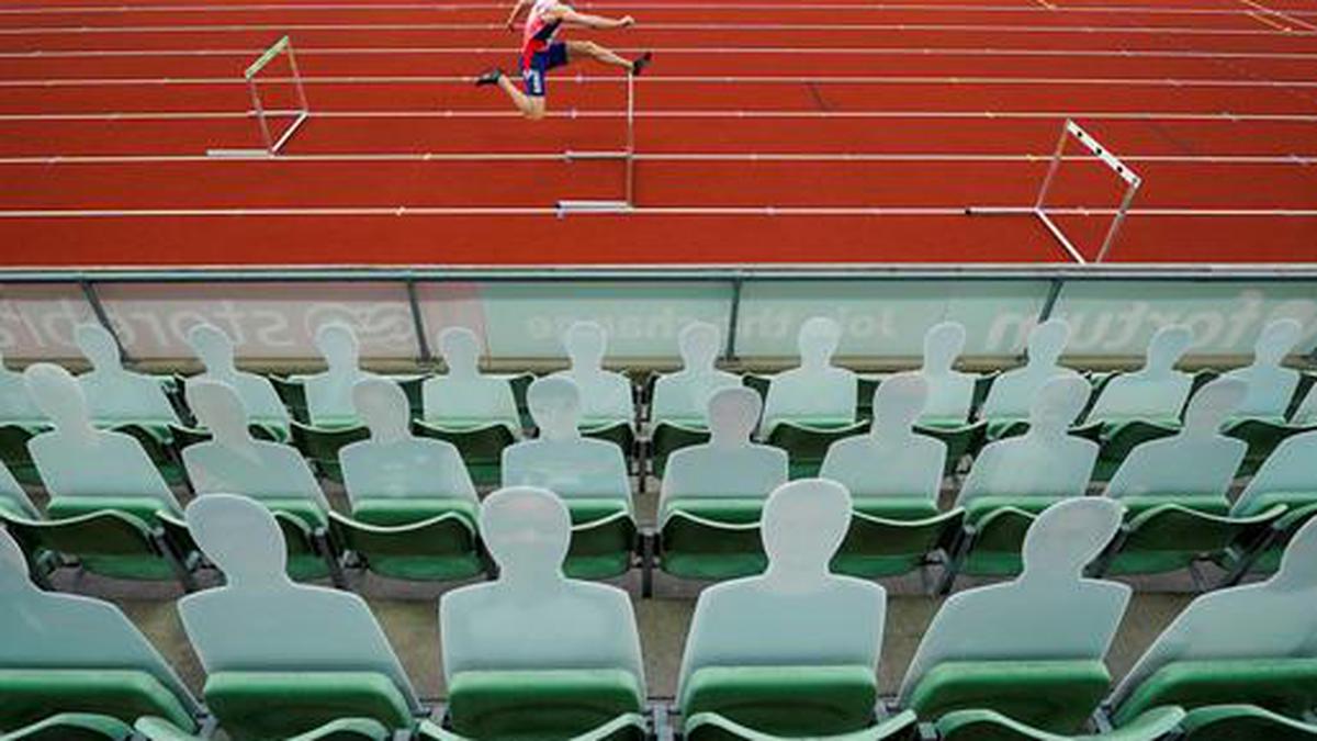 Remote battles and cardboard fans as athletics returns in Oslo