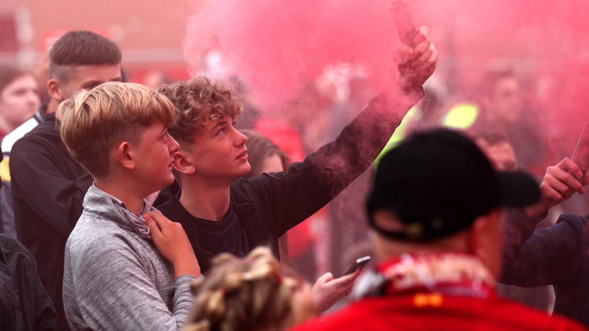 Liverpool 'disappointed' after fans celebrate outside Anfield