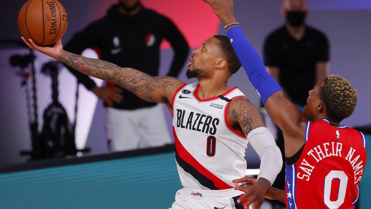 NBA roundup: Lillard scores 51, Embiid injured in Blazers' win