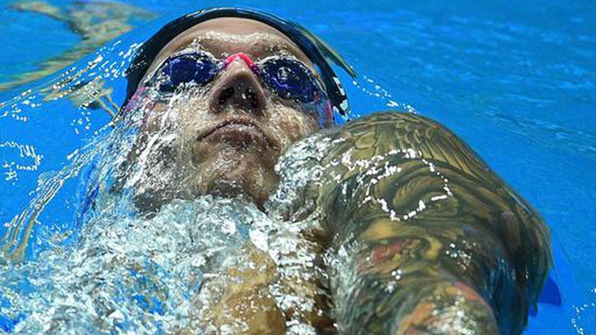 Dressel looks for negatives after golden swim treble