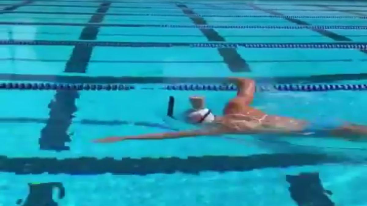 WATCH: Olympian Ledecky swims while balancing a glass of milk on her head