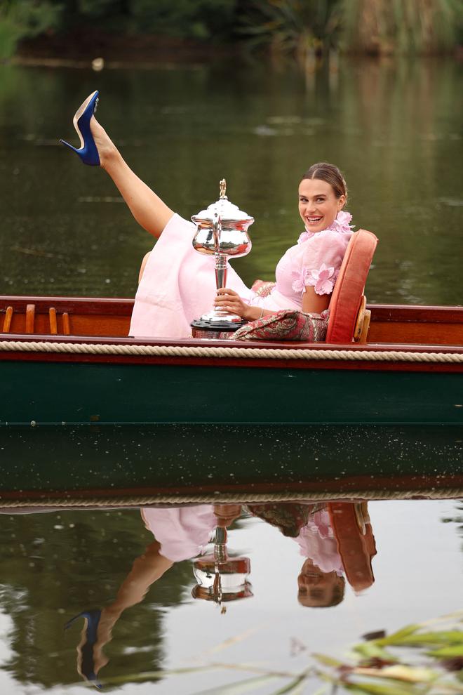 Celebration time: Belarus’ Aryna Sabalenka poses with the Daphne Akhurst Memorial Trophy on a gondola in the Royal Botanical Gardens.
