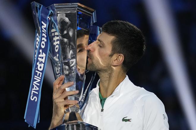 On top: Djokovic with the trophy after the final.