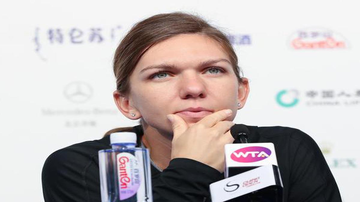 Simona Halep to play China Open despite chronic back problem