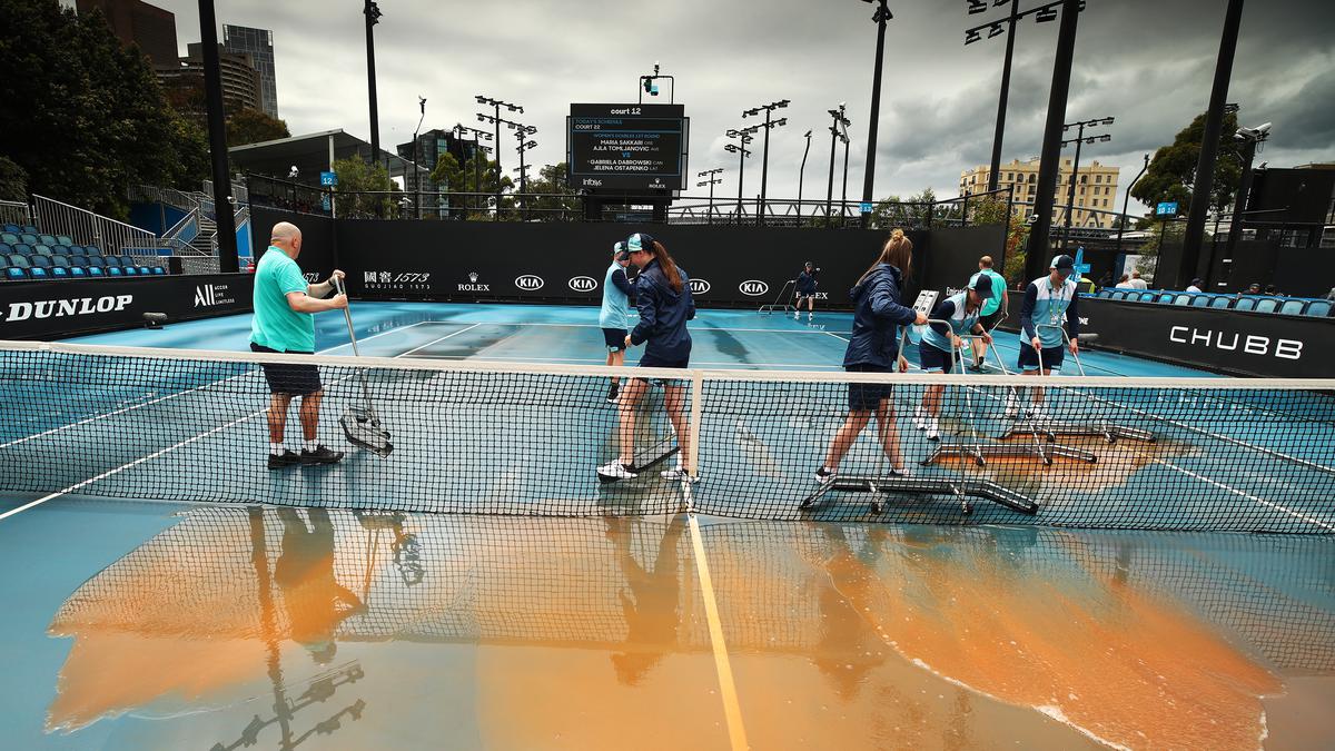 After smog, wind and rain, mud poses new challenge for Aus Open