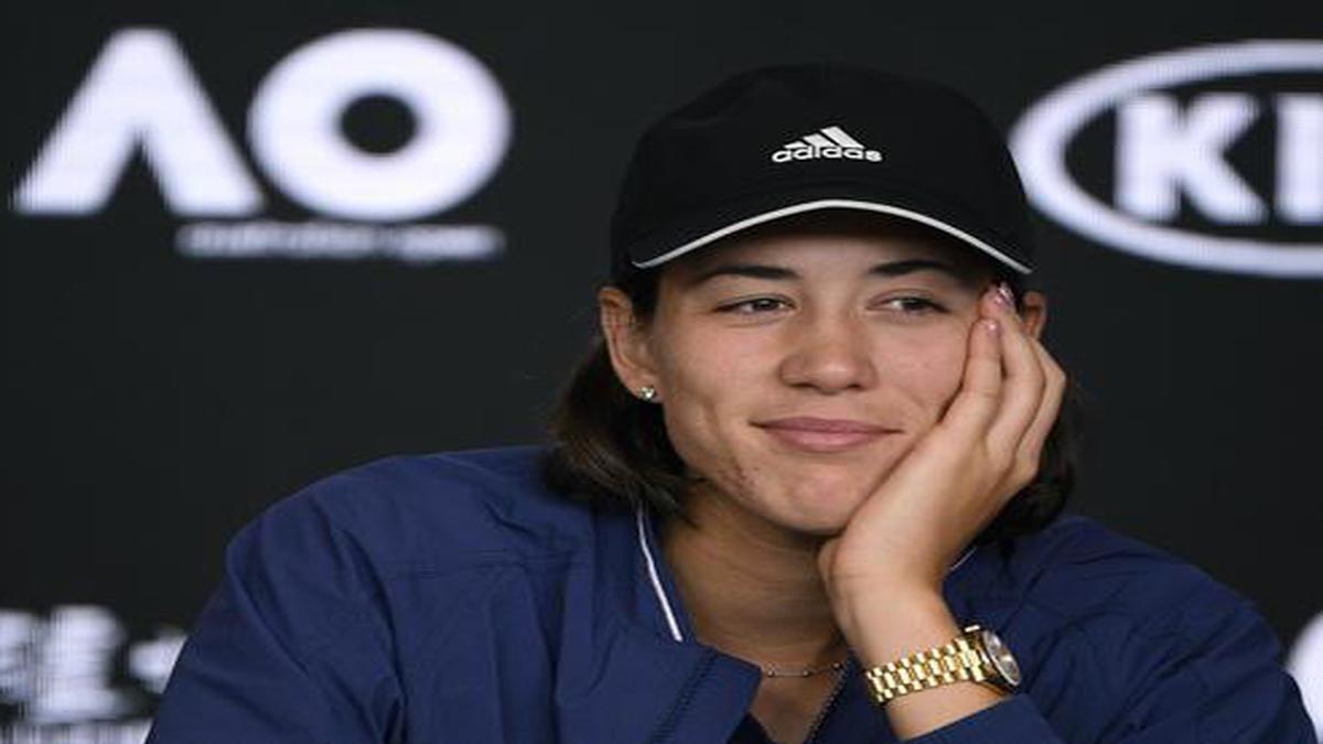 Australian Open: Muguruza 'smiling inside' despite final loss