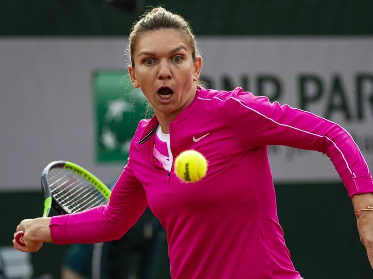 French Open Halep punishes Anisimova to reach last-16