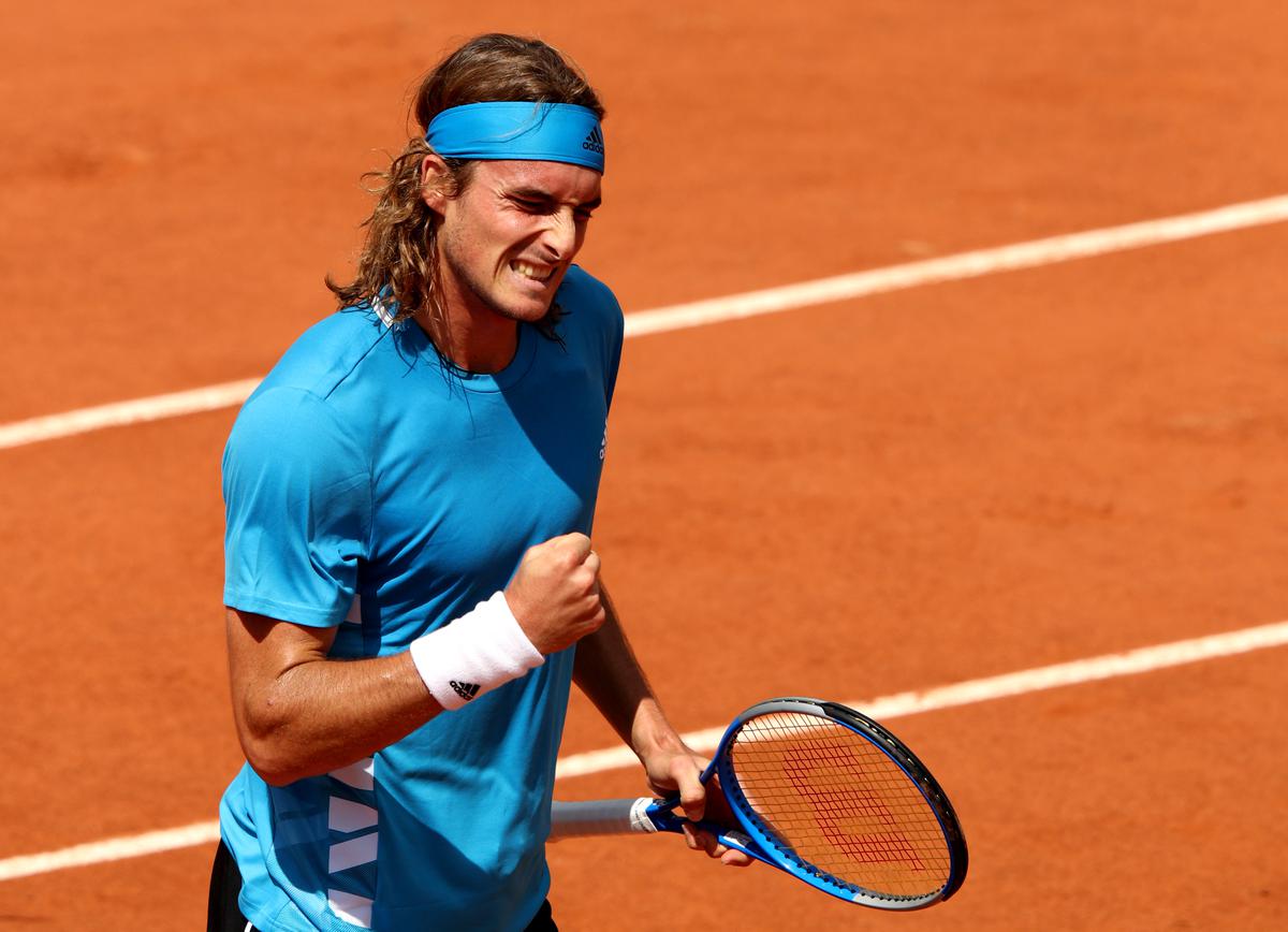 French Open Tsitsipas battles into Roland Garros third round