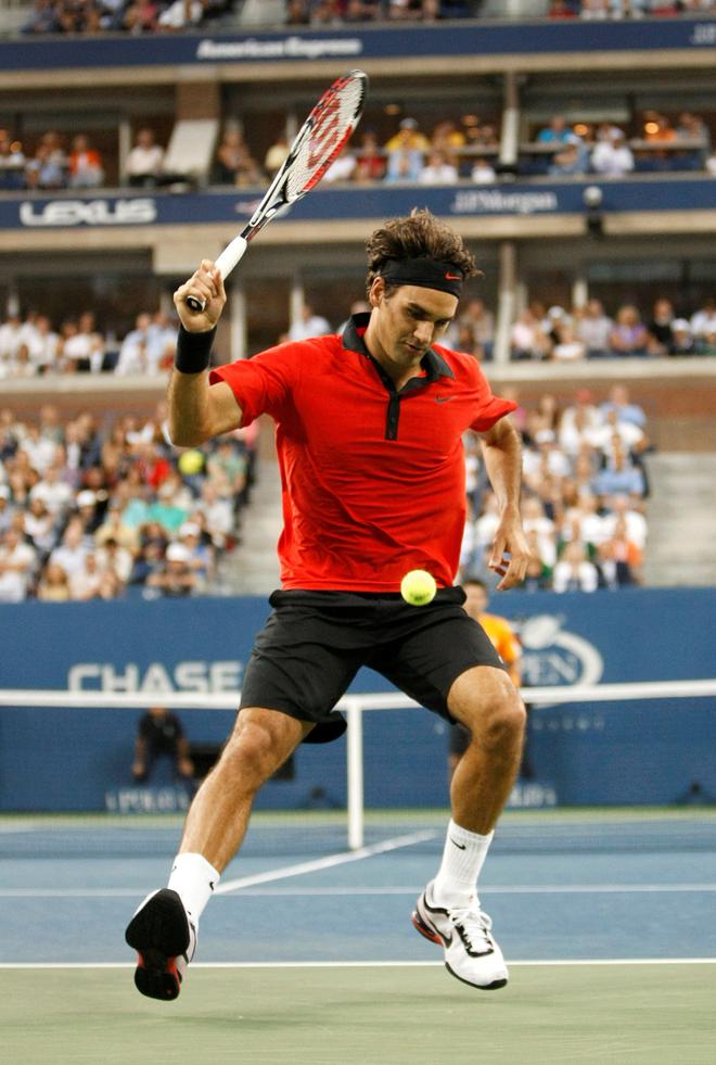 Trick master: Federer showed off his bold, jaw-dropping shots in big matches like his 7-6, 7-5, 7-5 victory over Novak Djokovic in the 2009 U.S. Open semifinals. On the penultimate point, the Swiss maestro conjured up a spectacular back-to-the-net, between-the-legs flick forehand passing shot winner that he called “the greatest shot of my career.”