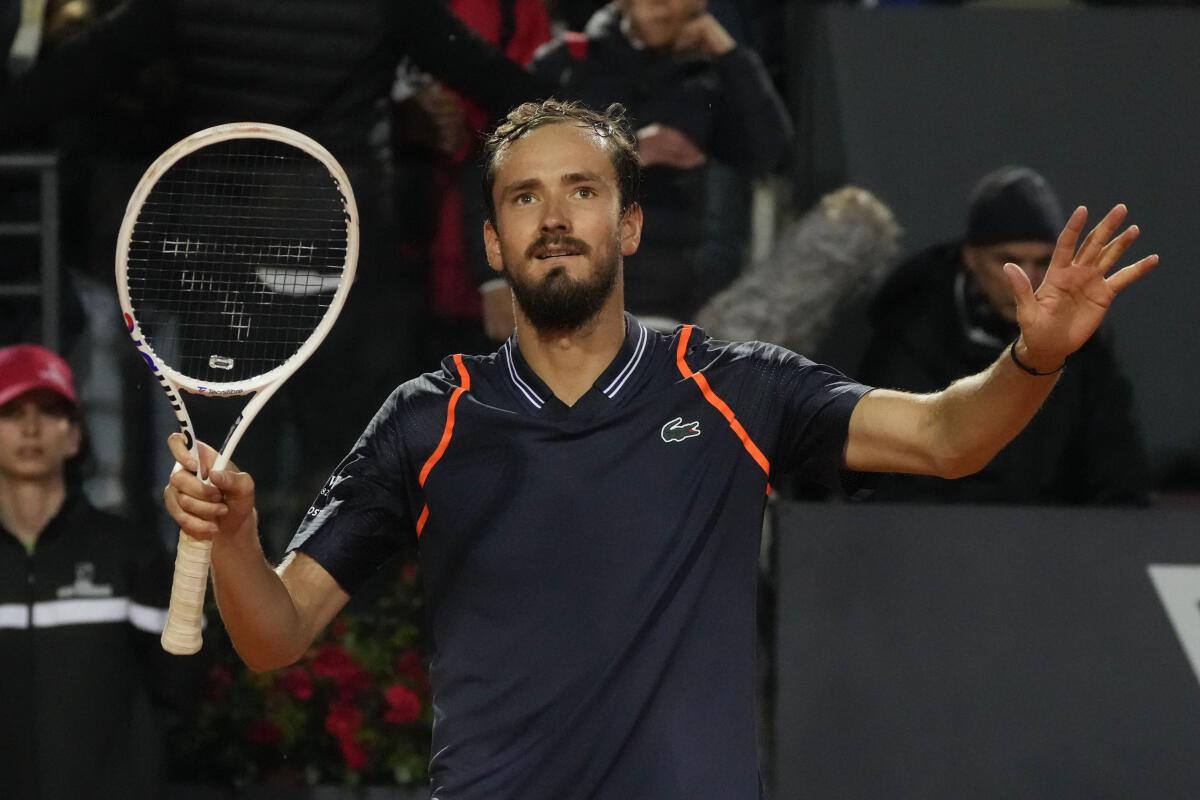 Medvedev makes his mark on clay by beating Rune for Italian Open title