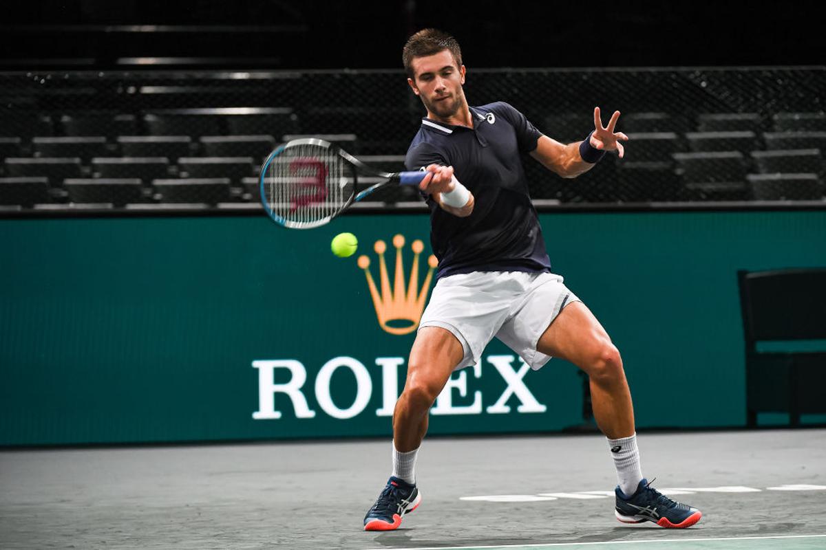 Croatian duo Coric, Cilic advance to second round at Paris Masters