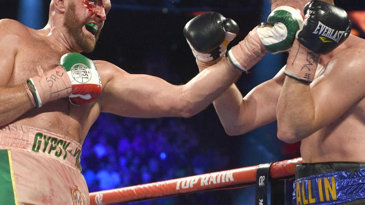 Tyson Fury wants to face 'bum' Deontay Wilder in February