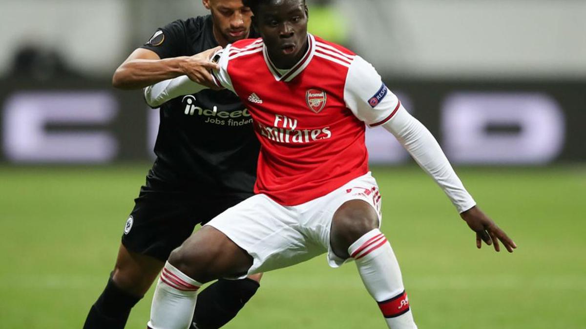 Arsenal youngster Saka hails 'legend' Ljungberg