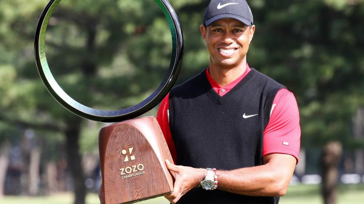 Woods savours record after matching Snead for 82 career wins