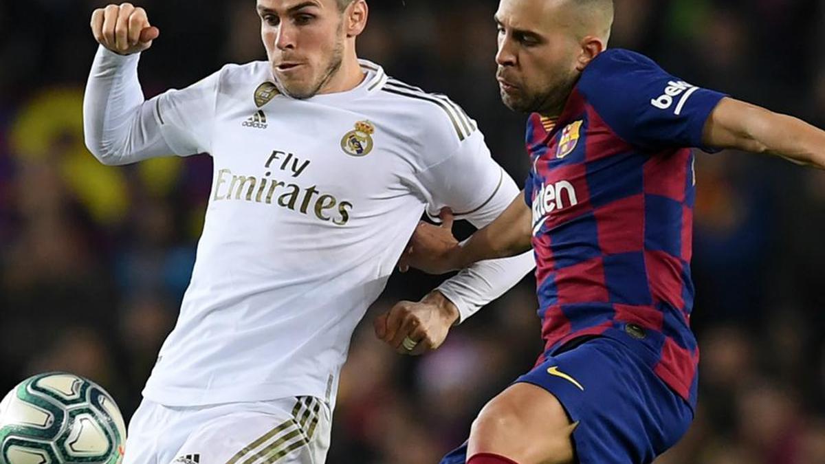 Barcelona and Real Madrid share spoils in goalless 'Clasico' marked by  Catalan protests