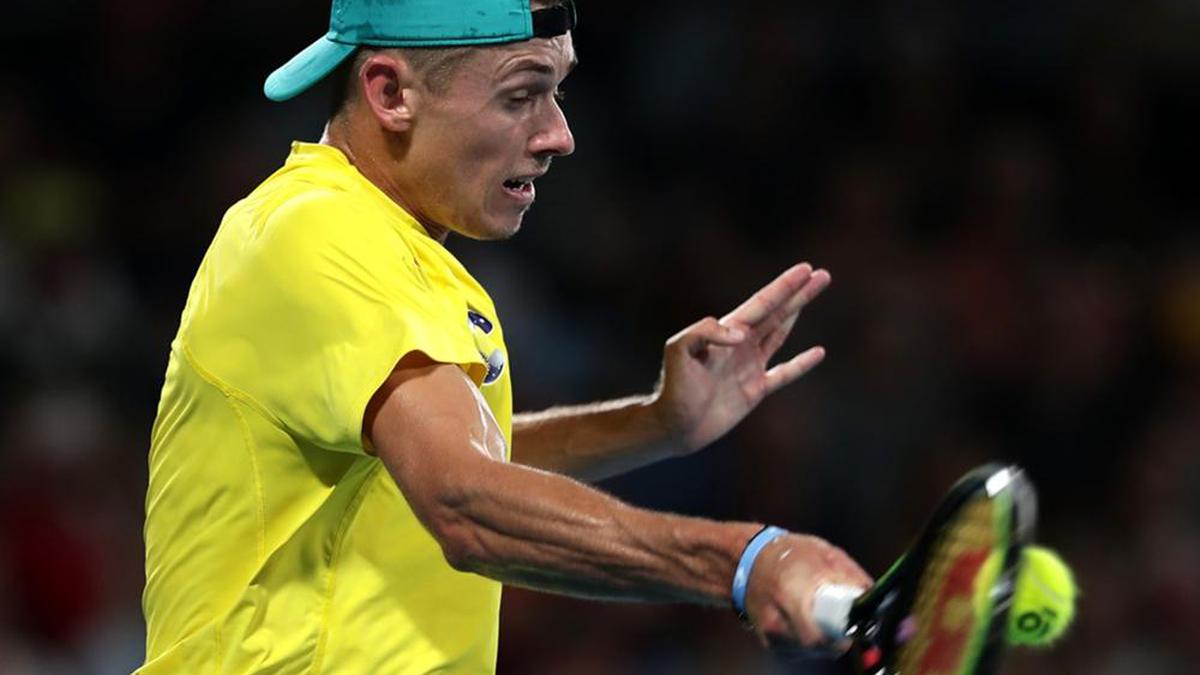 Alex de Minaur out of Australian Open due to abdominal injury