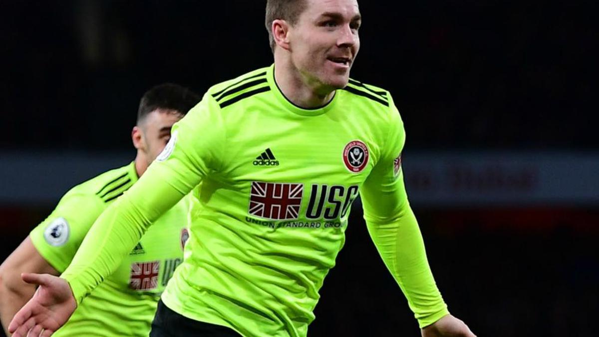 Premier League: John Fleck's goal holds Arsenal to 1-1 draw