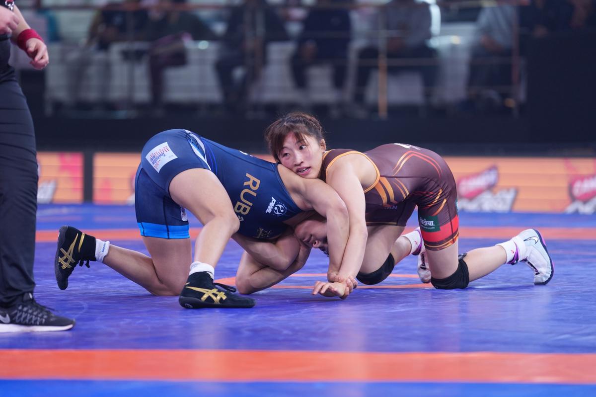 Sizing up opponents: Yui Susaki (right) during her stint in India, where she faced local talent and took stock of the next generation of challengers.